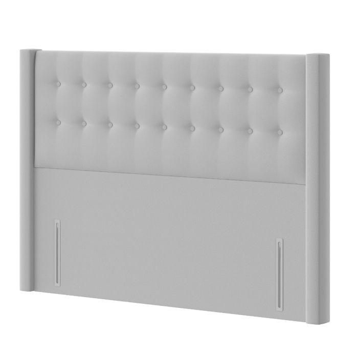 Handmade UK bed wing panel headboard with elegant fabric upholstery, showcasing detailed craftsmanship and stylish design.