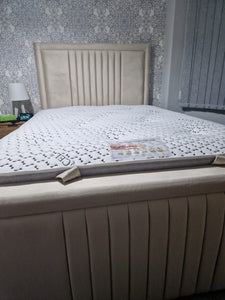 Luxury line Bumper Ottoman Divan Bed by SleepandBeds showing a stylish upholstered bed with storage ottoman and plush headboard.
