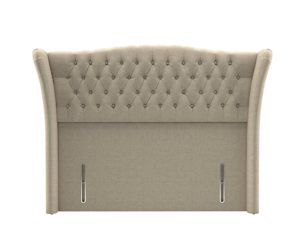 Handmade UK wing panel headboard by SleepandBeds, showcasing soft fabric upholstery and elegant winged design.