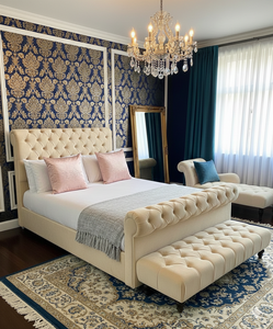 Roman sleigh bed from SleepandBeds featuring carved wood details and a classic, elegant design for a luxurious bedroom setting.