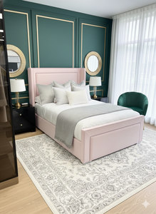 Charcoal gray upholstered bed frame from SleepandBeds, featuring a padded headboard and modern design for a stylish bedroom.